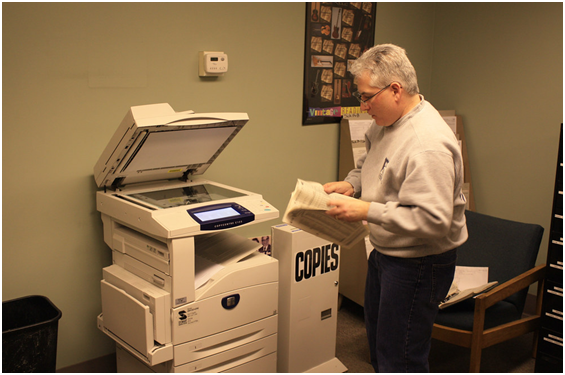 using copy machine in the workplace
